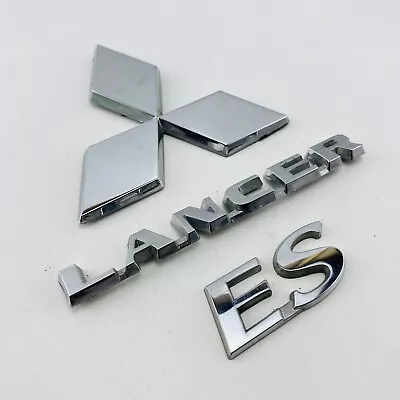 2004-2007 Mitsubishi Lancer ES Emblem Logo Letters Badge Rear Set Chrome OEM F66 • $50