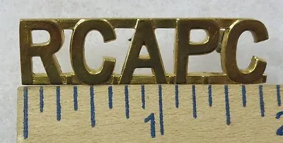 R.C.A.P.C - ORIGINAL WW2 Vintage CANADIAN ARMY METAL SHOULDER TITLE BADGE • $8.46