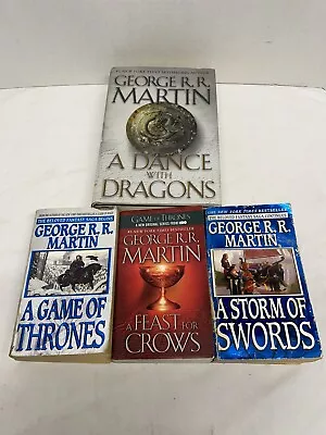 4 George RR Martin Books A Game Of Thrones & Crows Swords Dance Dragons. • $34.99