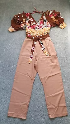 Brown Floral Jumpsuit  Size 8 • $25