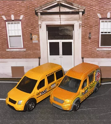 Lot Of 2 Matchbox Ford Transit Connect Taxi Cab New LFFP Die Cast 1:64 • $7.85