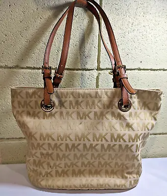 Authenticated Michael Kors Gold Monogramed Tote • $43.47