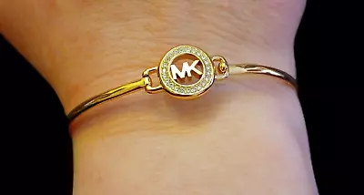 Michael Kors Gold Tone 7  Monogram Bangle Bracelet   • $55