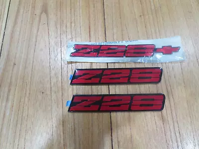 NOS 1991 - 1992 Z-28 RED ROCKER PANEL And REAR BUMPER EMBLEMS • $129