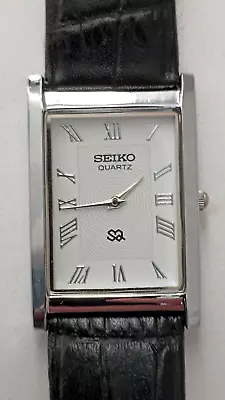 Men's  Seiko SQ Slim Tank Watch • $39.99