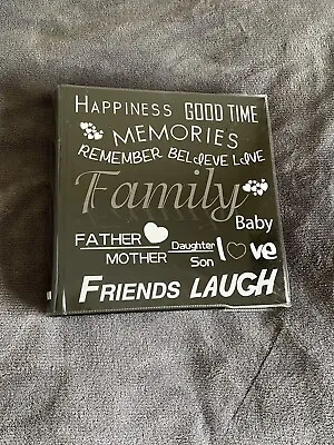 Family Photo Album • £7