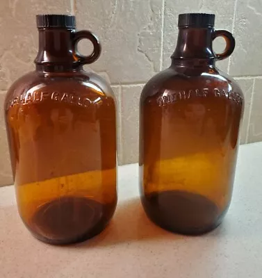 Two Vintage Embossed Amber Brown Glass Duraglas Half Gallon Bottles Jugs • $10