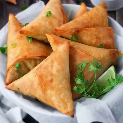 Home Made Vegetable Samosa & Rolle • £4.99