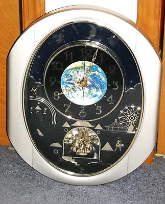 Small World Rhythm Cosmos Melodies Wall Clock Rotates Motion Works Nice • £193.65