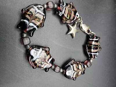 Vintage Hand Blown Glass Fish Bracelet Black And Gold W/Silver Star Charm • $13