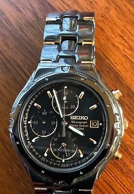 Seiko Men's 7T62-0CJ0 Quartz Chronograph Black Titanium + Gold Accent Watch • $195
