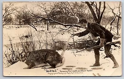  Salted  In Monmouth Illinois~Exaggerated Rabbit & Hunter~WH Martin 1909 RPPC • $12