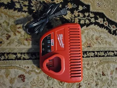 Milwaukee M12 Lithium-ion Battery Charger - Red (48-59-2401) • $10