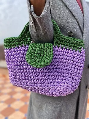 Explore Artistry With Our Handcrafted Knit Shoulder Bag Featuring Woven Crochet • $59