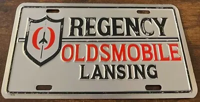 Regency Oldsmobile Dealership Booster License Plate Lansing MI Rocket Logo • $59.99