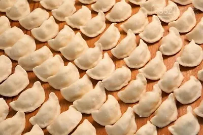 Homemade Food Dumplings Pelmeni Vareniki (pirogies)With Various Fillings. • $25