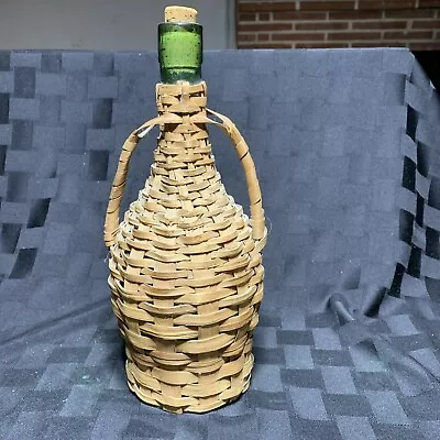 Double Handled Demijohn Green Bottle Wrapped In Wicker  • $27