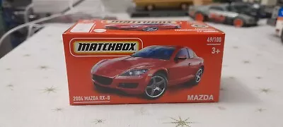 MATCHBOX 2024 #49 - 2004 Mazda RX-8 (Red - Power Grab - Unopened)  • $5