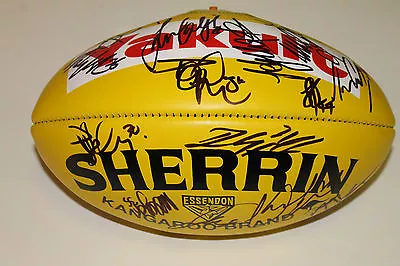 Essendon  Team Signed Yellow Sherrin Football Unframed (sponsor : Yakult) • $299