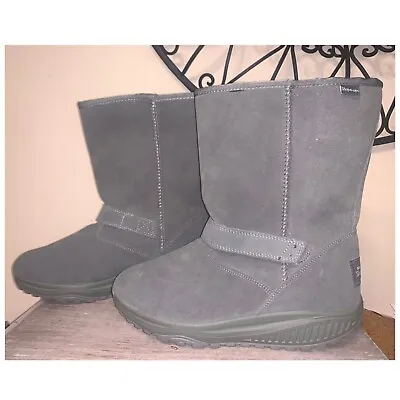 $65 • Buy Skechers Shape Ups Boots Size 10