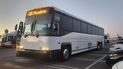 2004 Mci D4500 - 57 Passenger Coach Bus • $34995