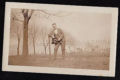 Antique Vintage Photograph Man In Suit Leaning On Post In Backyard • $7