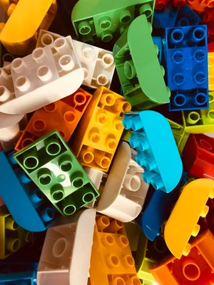 BULK LOT_DUPLO 2x4 Inv Bow # 98224 _Assortment Of Varied Colours_66 Pieces • $23.99