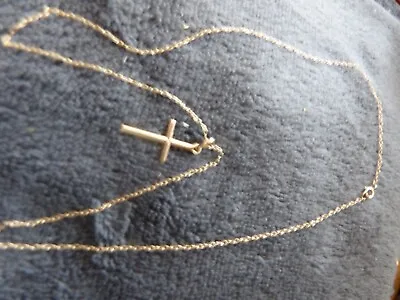 A Small 9ct Gold Cross On A 9ct Gold 17ins Appx Chain • £68