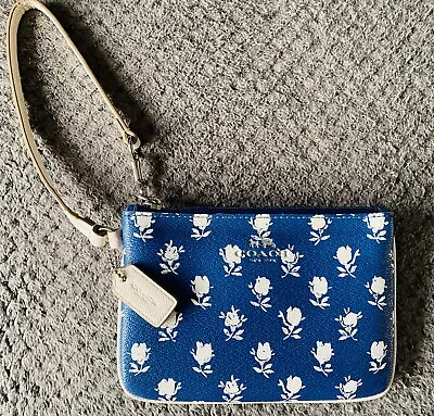 Coach Blue Wristlet With White Flowers Small Wristlet With Strap   • $25