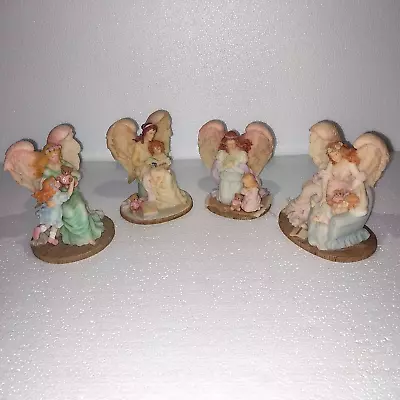 VINTAGE SERAPHIM CLASSIC Lot Of 4 Angel Figurines  Angels To Watch Over Me  1996 • $49.95