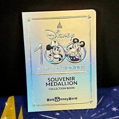 Disney Parks 100 Years Of Wonder Souvenir Medallion Coin Holder Collector Book  • $35.49