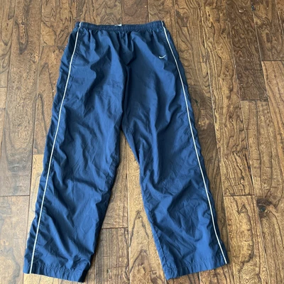 $30 • Buy Vintage 90s Nike Swoosh Athletic Windbreaker Track Pants Extra Large Blue White