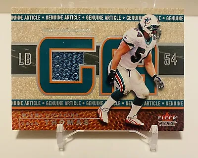 $5.99 • Buy 2002 FLEER GENUINE ZACH THOMAS GAME WORN JERSEY #d/500  COA SLIDE OUT DOLPHINS