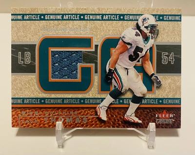 $5.99 • Buy 2002 FLEER GENUINE ZACH THOMAS GAME WORN JERSEY #d/500  COA SLIDE OUT DOLPHINS