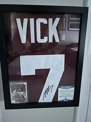 Michael Vick Autographed Replica Virginia Tech Jersey With Rookie Card In Case. • $200