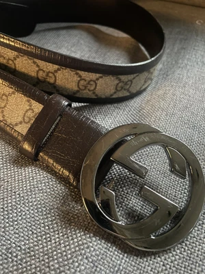 £189 • Buy Gucci Canvas Belt With GG Buckle