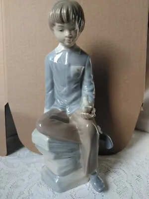 Nao By Lladro Sitting Boy Holding Bird Figurine Ornament 9.5ins • £30