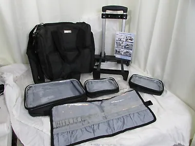 BAFASO Rolling Makeup Case With 3 Removable Pouches And 1 Makeup Brush Pouch • $75
