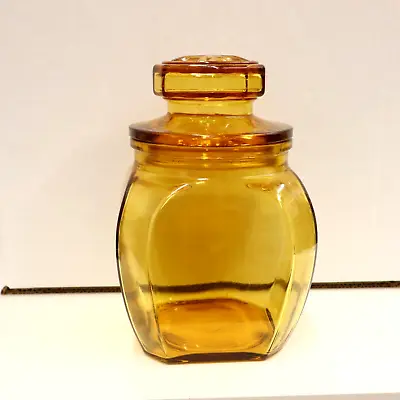 Vintage Honey Gold Amber Glass Apothecary Jar Canister Starburst Lid 7.75 In • $29.95