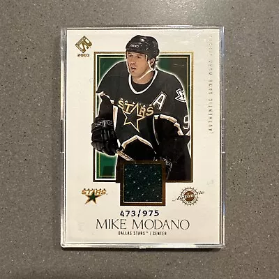 2003 Pacific Private Stock Reserve Mike Modano Game Worn Jersey #473/975 • $10