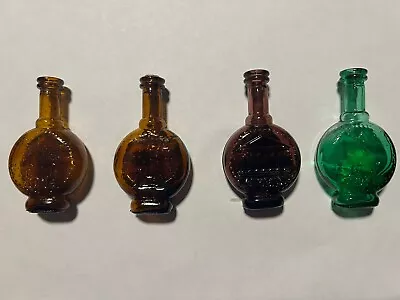 Vintage Tiny Glass Tincture Bottles Taiwan Set Of Four Green Glass Brown • $0.99