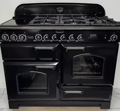Rangemaster Classic Deluxe 110 Dual Fuel Range Cooker In Black And Chrome. • £1350