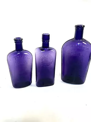 Vintage Purple Glass Whiskey Bottles Embossed Dug Bottles Set Of 3 • $45