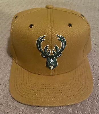 NEW Men's Mitchell & Ness NBA Milwaukee Bucks Adjustable Cap Hat Tan & Green A • $14.95