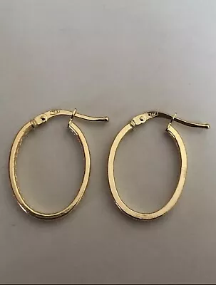 18 Carat Gold Earrings • £110