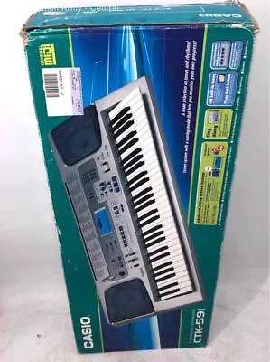 Casio CTK-591 Silver 61 Key Built In Tunes Portable Digital Electronic Keyboard • $9.99