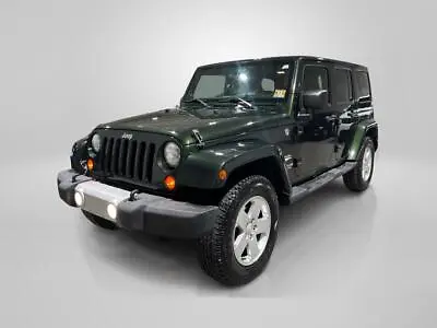 2011 Jeep Wrangler Sahara • $6471