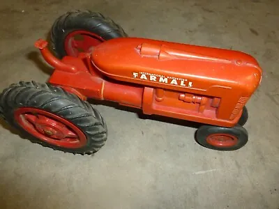 Vintage Plastic Farmall Tractor. Played W/ Cond. Unknown Date & Manufacturer  • $12