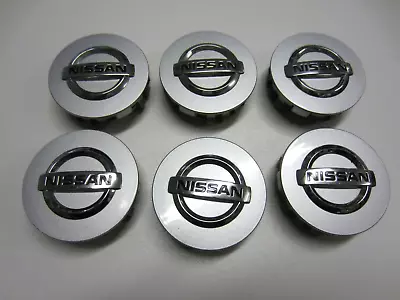 NISSAN NAVARA D40 Wheel Rim Centre Hub Caps Silver Genuine 70mm  40342EB210 1pcs • $17.89