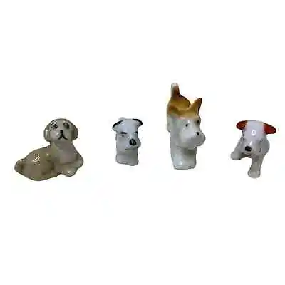 4 Vintage Ceramic Dog Figurines Made In Japan And 1 Wade • $25